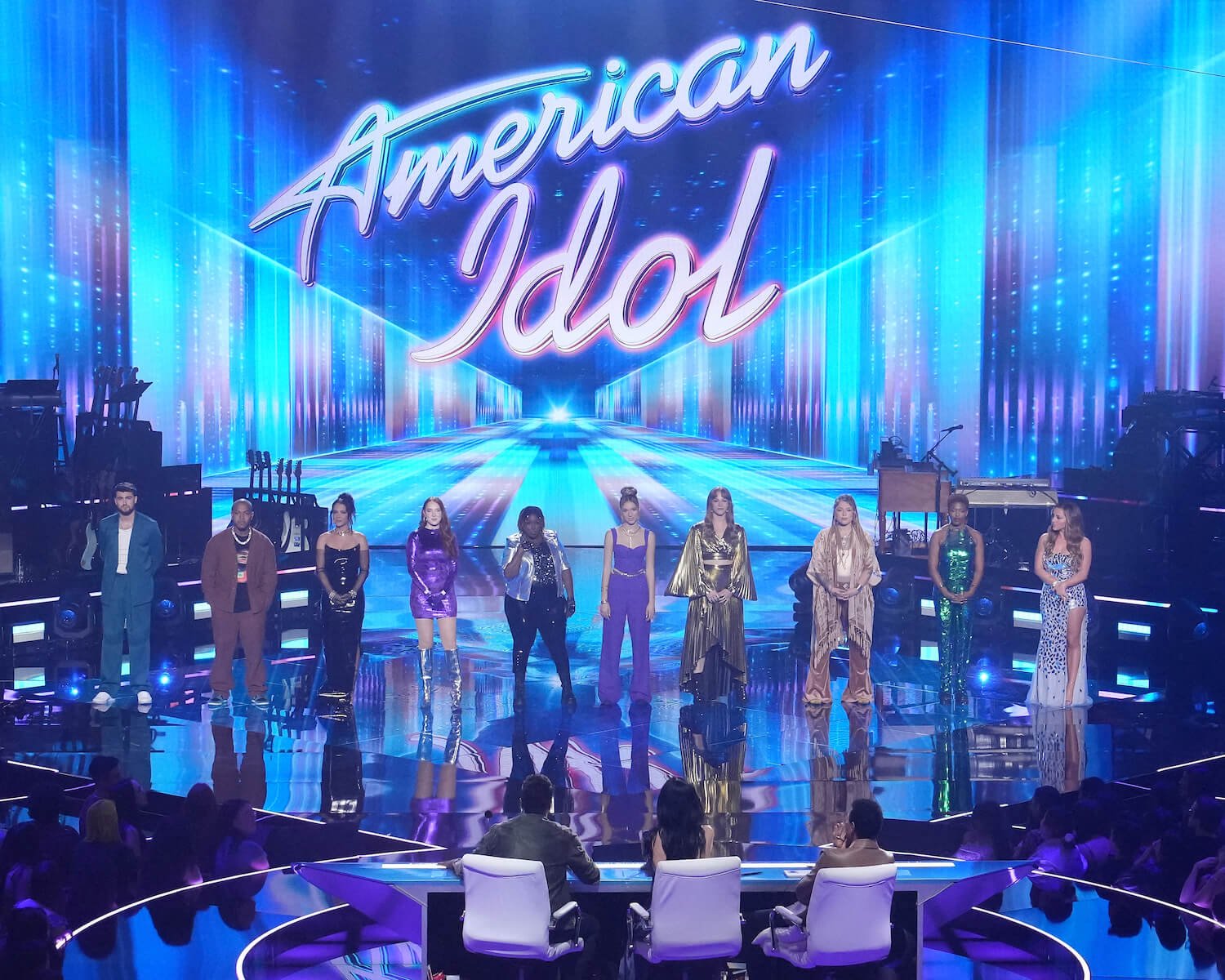 'American Idol' 2023 contestants on stage with the logo above them. The 'American Idol' 2023 top 10 are revealed on Sunday, April 30