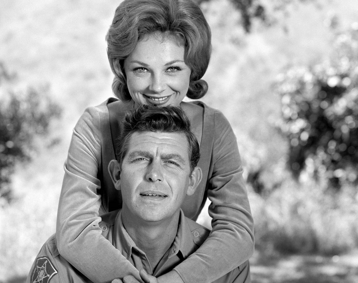Andy Taylor and his season 3 girlfriend, Nurse Peggy pose for a promotional photo for 'The Andy Griffith Show'