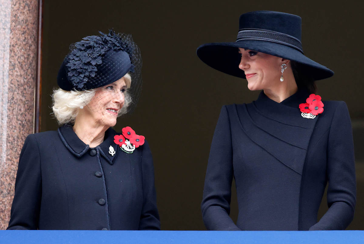 Camilla Parker Bowles and Kate Middleton, who are predicted to coordinate their coronation day outfits, stand together