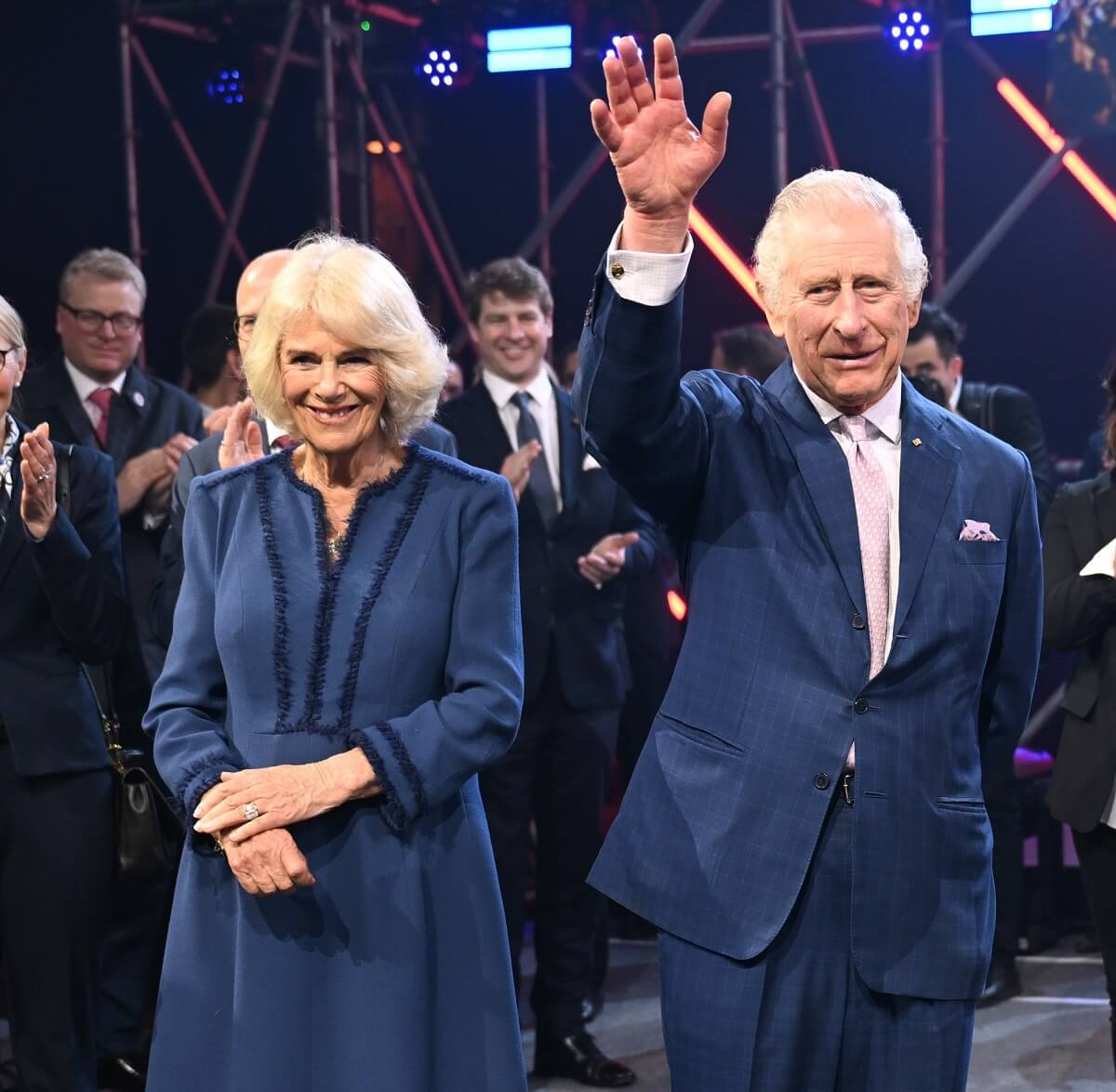 Camilla Parker Bowles and King Charles III smiling at a reception in Hamburg, Germany