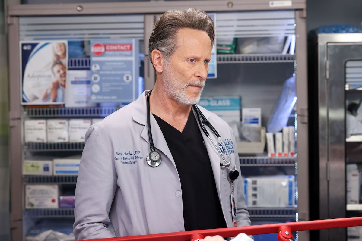 Steven Weber as Dean Archer wearing a lab coat in 'Chicago Med,' which NBC has renewed for season 9
