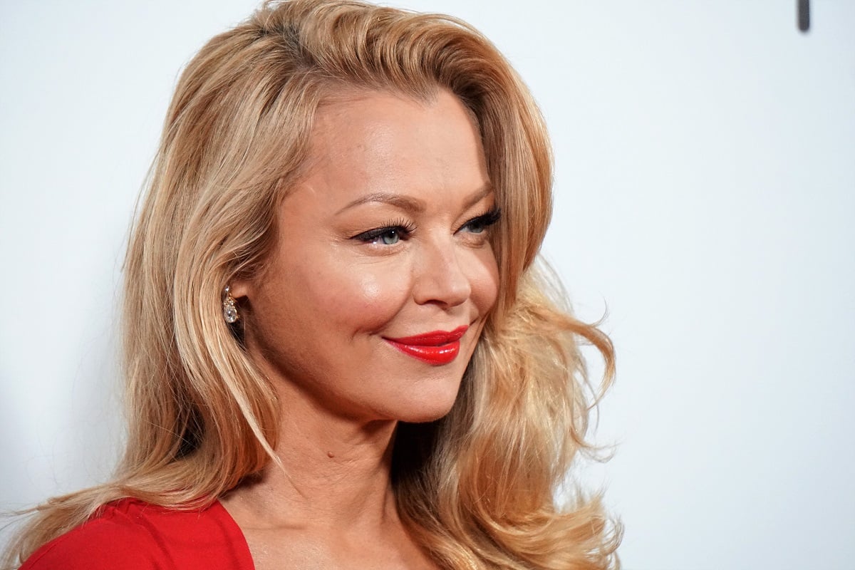 'Days of Our Lives' star Charlotte Ross in a red dress; posing on the red carpet.