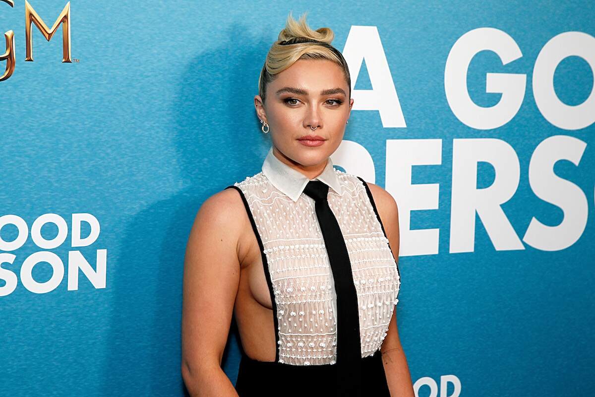 Actor Florence Pugh attends "A Good Person" New York Screening in a black and white tuxedo top