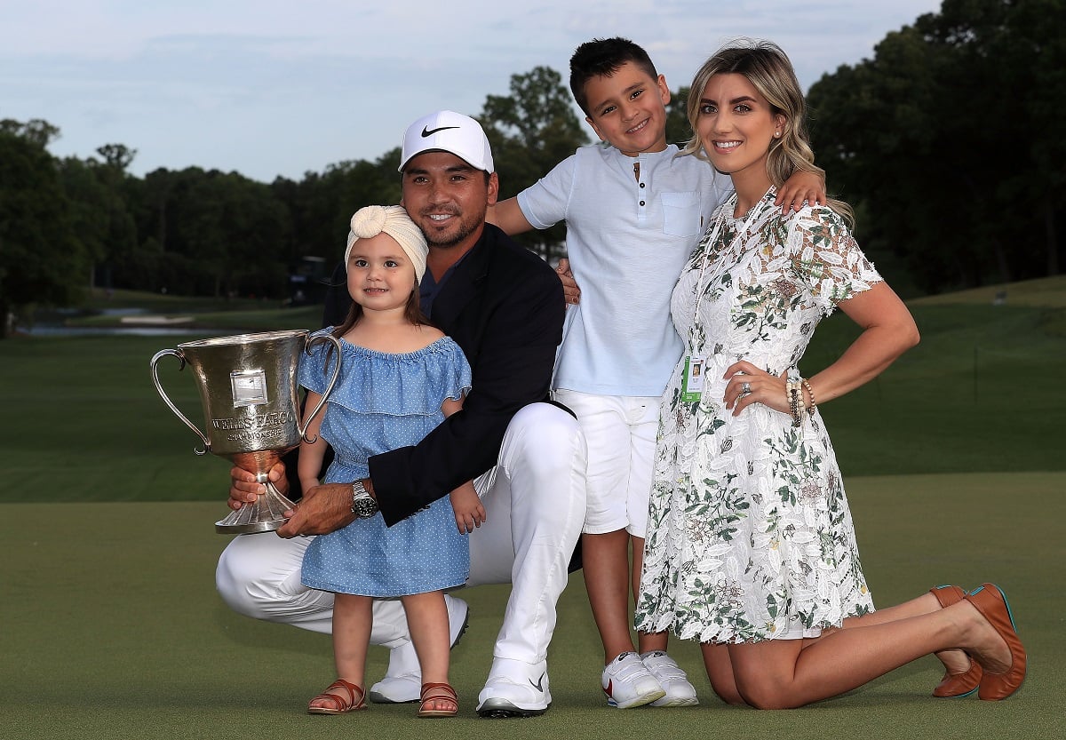 Jason Day and his wife, Ellie, pose with their children, Dash and Lucy, after the Wells Fargo Championship