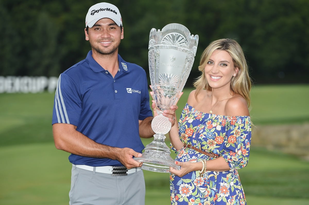 Jason Day poses with his wife Ellie after victory at The Barclays