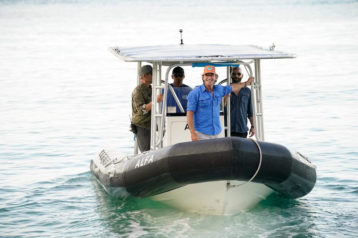 Jeff Probst appears by boat for a Survivor episode