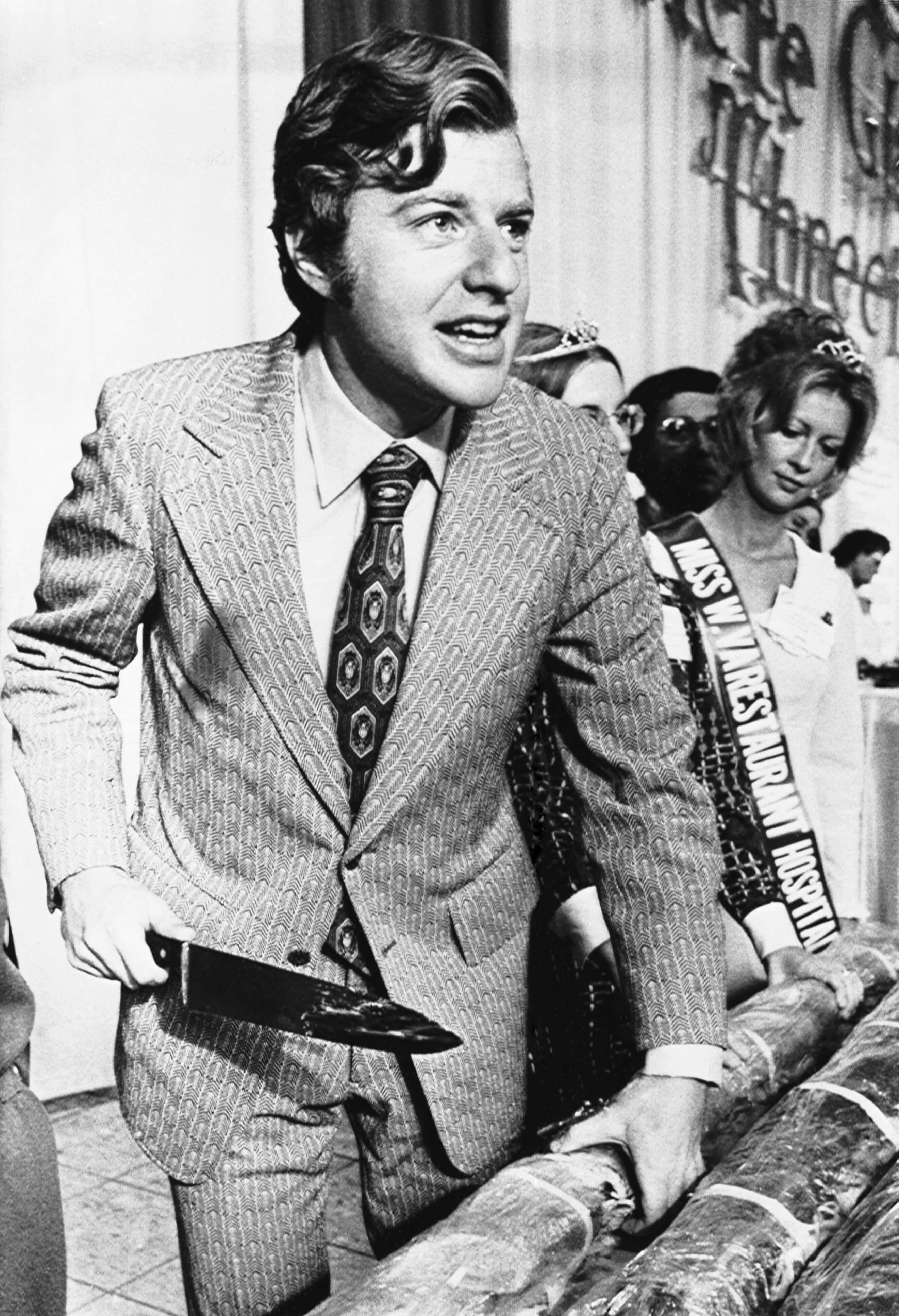 A black and white photo of Jerry Springer in 1974. Jerry Springer as involved in a scandal that may have threatened his relationship with his wife.