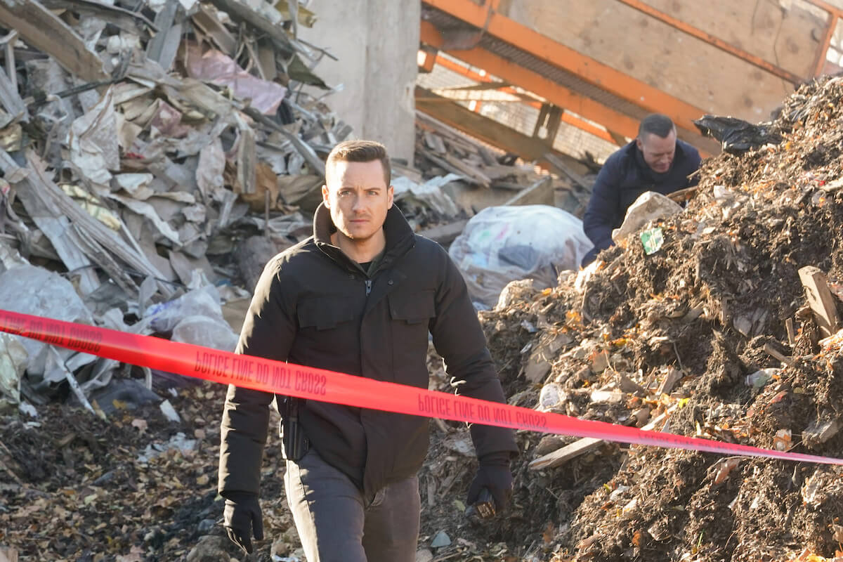 Jesse Lee Soffer as Jay Halstead in 'Chicago P.D.' walking behind crime scene tape