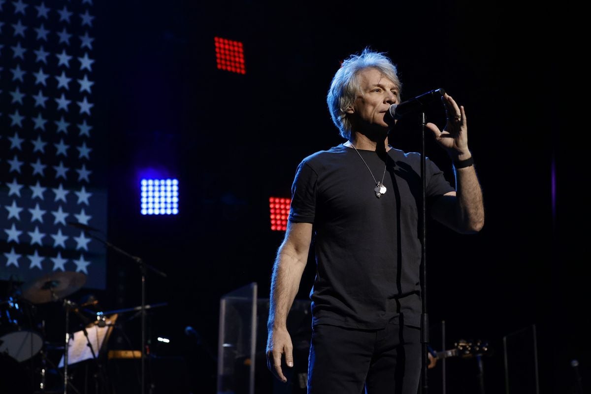 Jon Bon Jovi appears onstage at a concert.