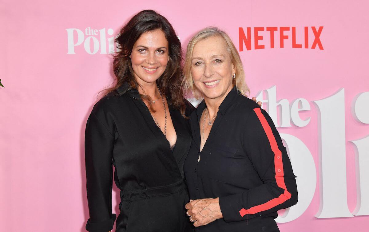 Julia Lemigova and Martina Navratilova standing together and smiling