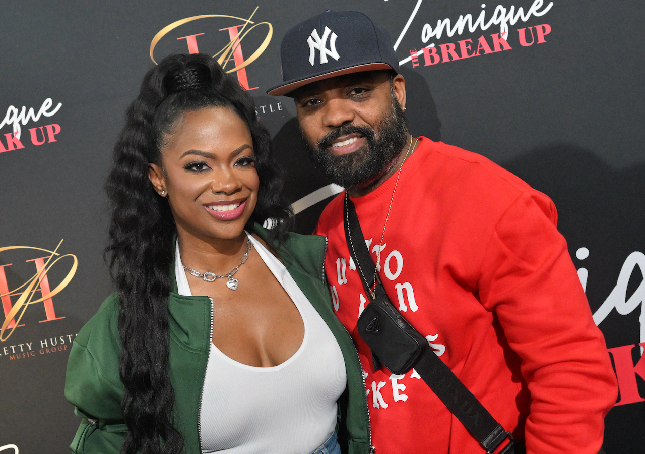 Kandi Burruss and Todd Tucker pose for photo; Tucker worked in television production and even on 'RHOA' before marrying Burruss