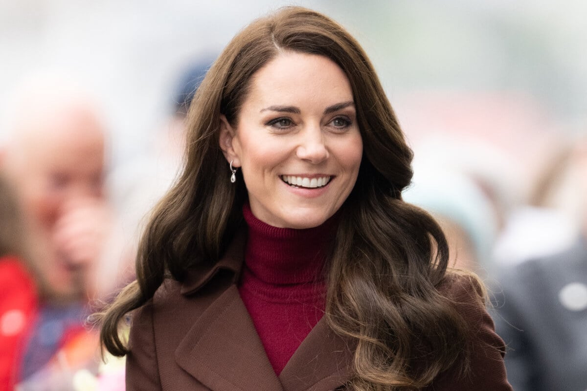 Kate Middleton, whose Years of 'dressing too old for her age' have made her image a 'constant, according to a historian, smiles