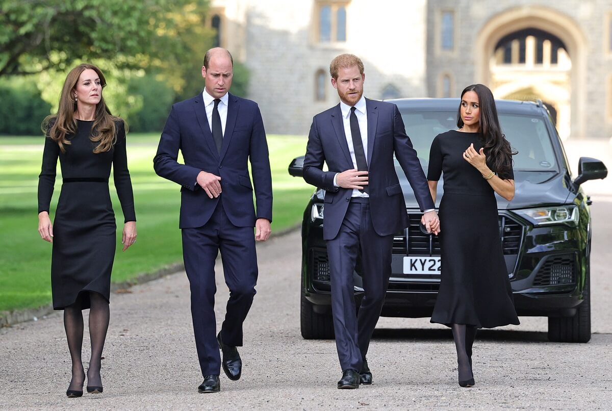 Kate Middleton, Prince William, Prince Harry, and Meghan Markle arriving on the Long Walk at Windsor Castle