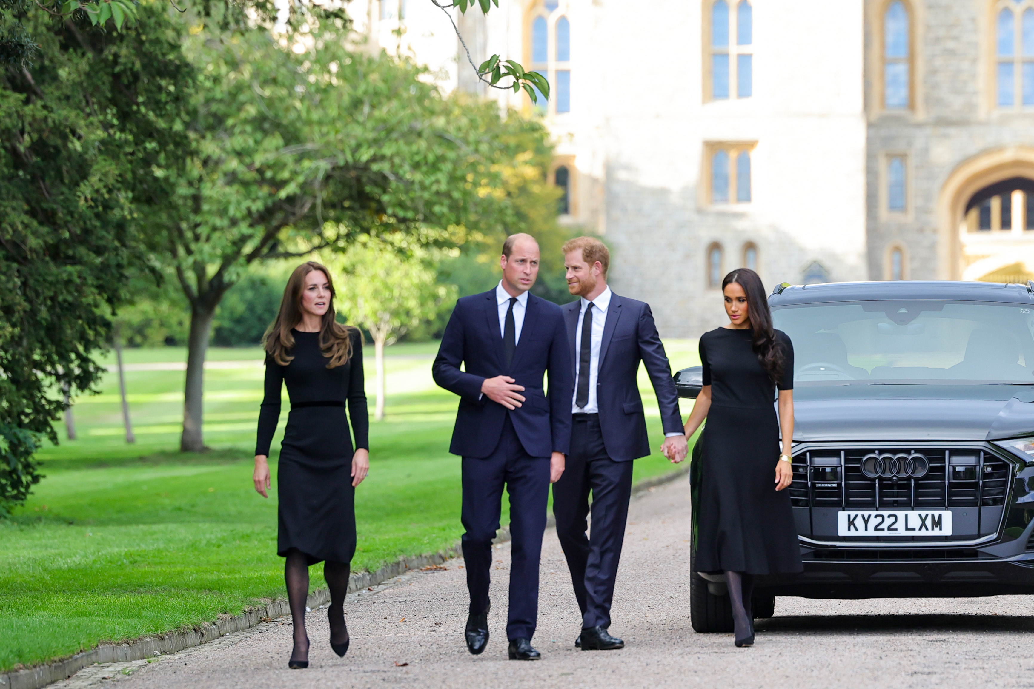 Kate Middleton, Prince William, Prince Harry, and Meghan Markle on the Long Walk at Windsor Castle