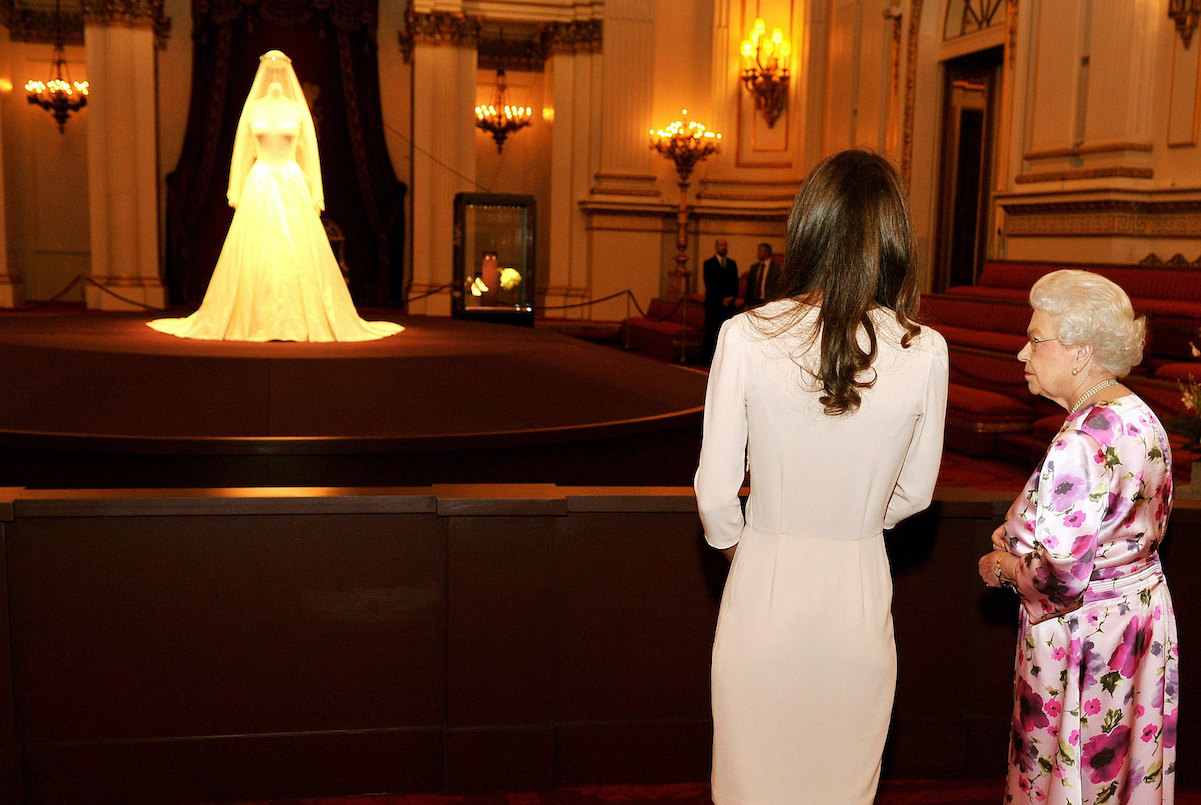 Kate Middleton and Queen Elizabeth with backs to camera