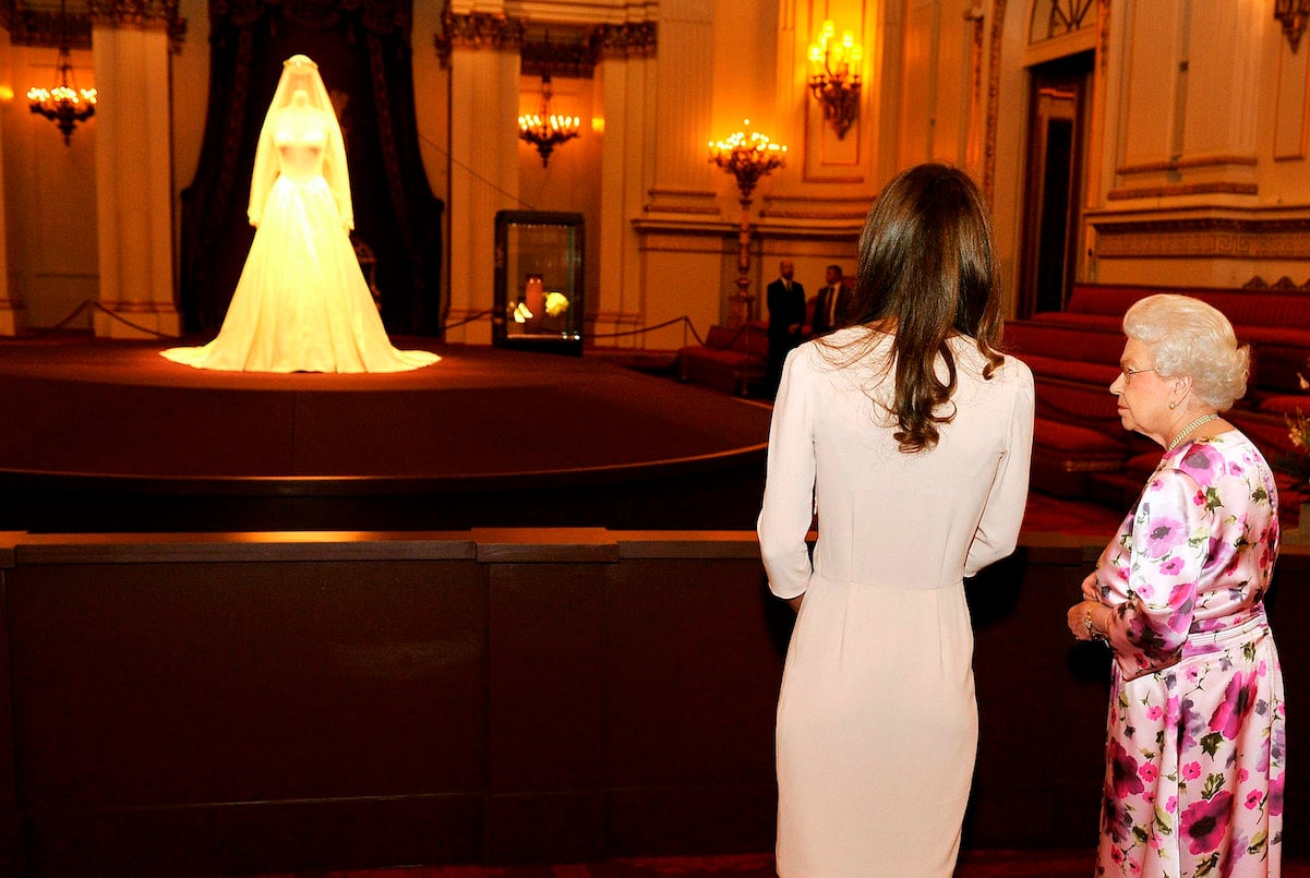 Kate Middleton and Queen Elizabeth with backs to camera