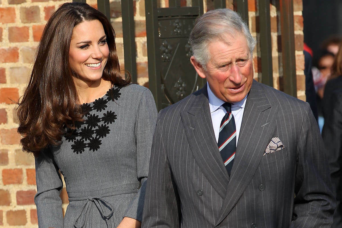 Kate Middleton, who may not wear a tiara to the coronation, walks with King Charles