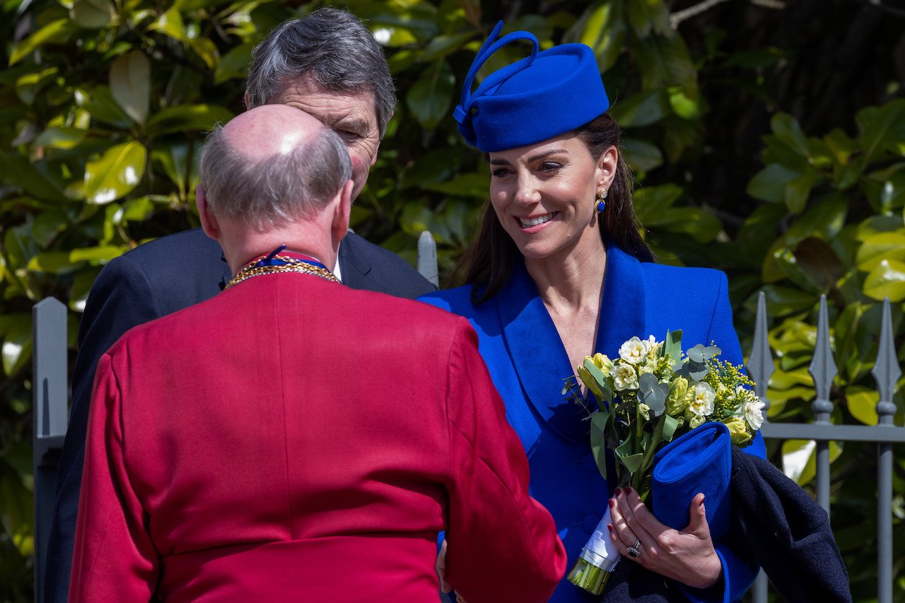 Kate Middleton, Princess of Wales, greets the Dean of Windsor, David Connor, as she departs after attending the Easter Sunday church service at St George's Chapel in Windsor Castle on April 9, 2023, in Windsor, United Kingdom.