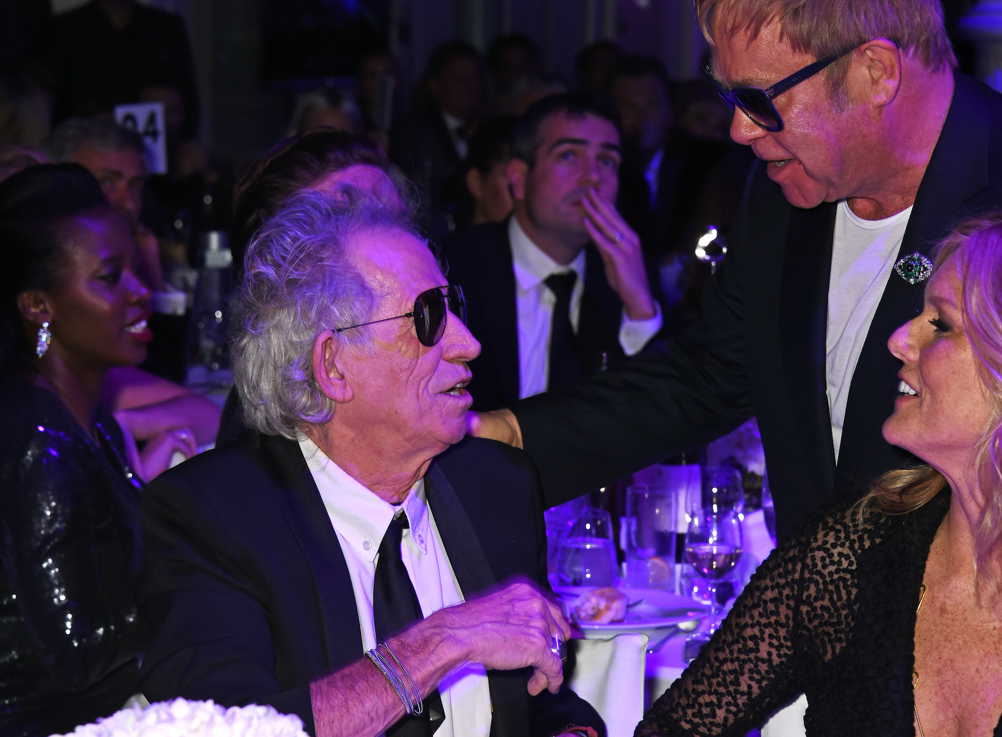 Keith Richards and Elton John greet each other at the GQ Men of the Year Awards in 2015