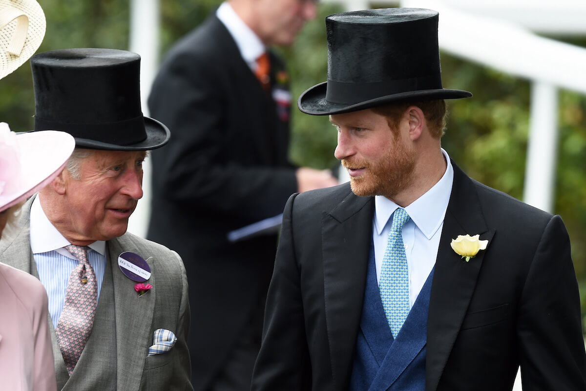 King Charles III, who is featured in heartbreaking 'Spare' descriptions as a father, with Prince Harry