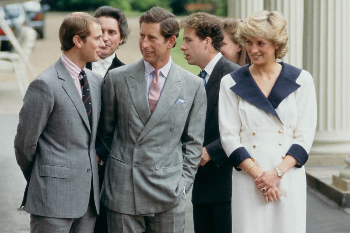 King Charles and Princess Diana do mirrored body language next to Prince Edward in a 1987 photo 