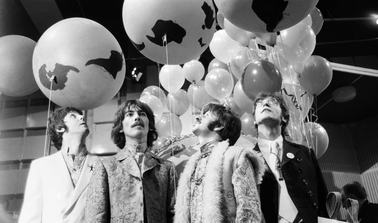Paul McCartney, George Harrison, Ringo Starr, and John Lennon at Abbey Road Studios on June 24, 1967, doing press for the 'Our World' live satellite broadcast.
