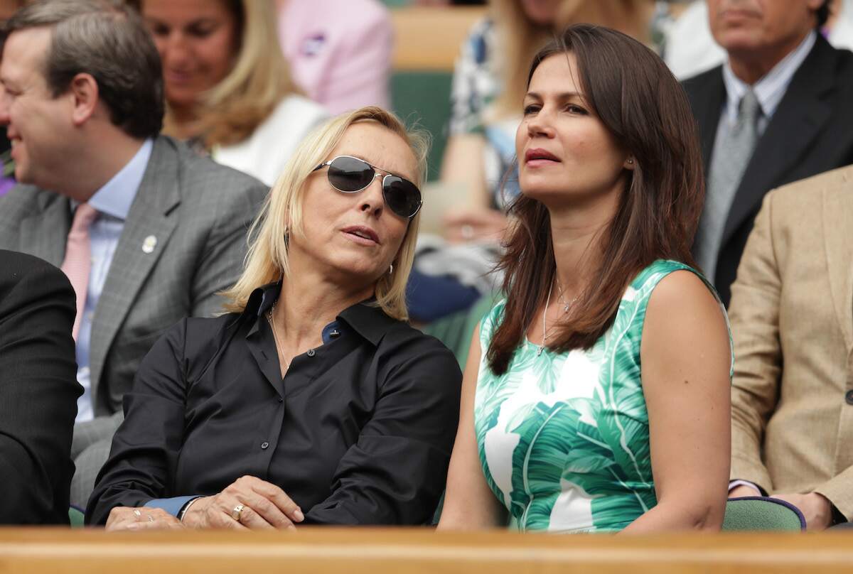 Couple Martina Navratilova and Julia Lemigova watch Serena Williams at Wimbledon in 2016