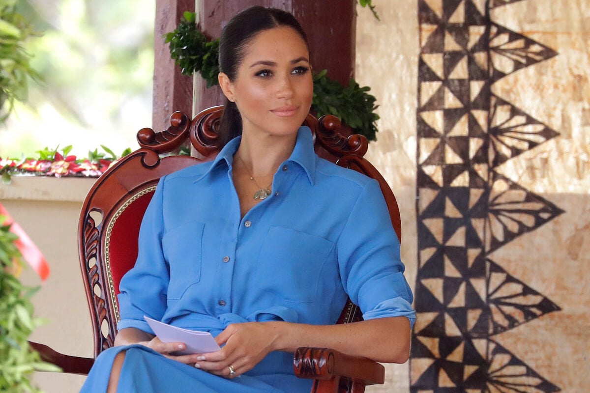 Meghan Markle, whose coronation absence is a 'huge relief,' looks on