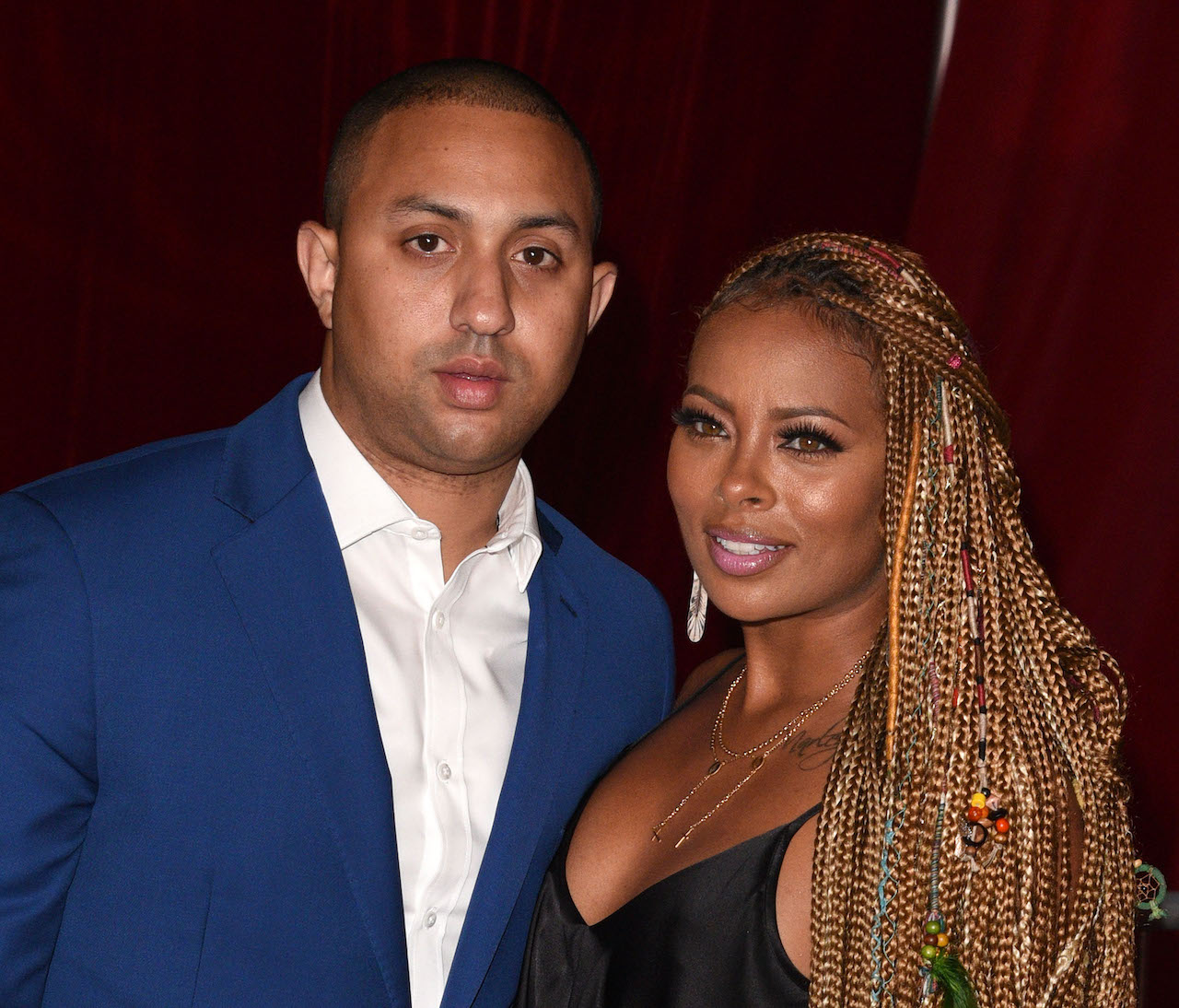 Michael Sterling and Eva Marcille pose for photo; Marcille filed for divorce after four years of marriage