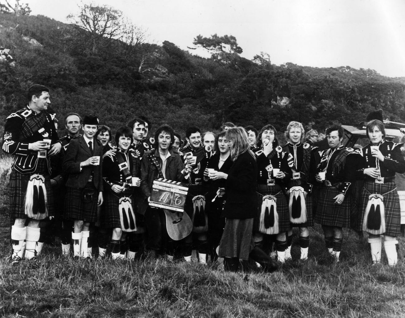 Paul McCartney with Wings and the pipe band from the music video for 'Mull of Kintyre' in 1977.