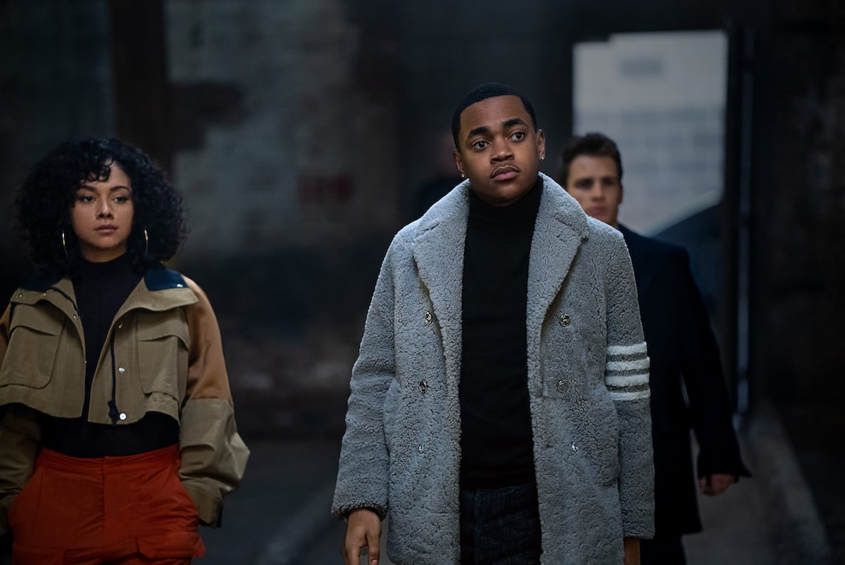 Alix Lapri as Effie Morales, Michael Rainey Jr. as Tariq St. Patrick and Gianni Paolo as Brayden Weston walking into a dark warehouse in 'Power Book II: Ghost'