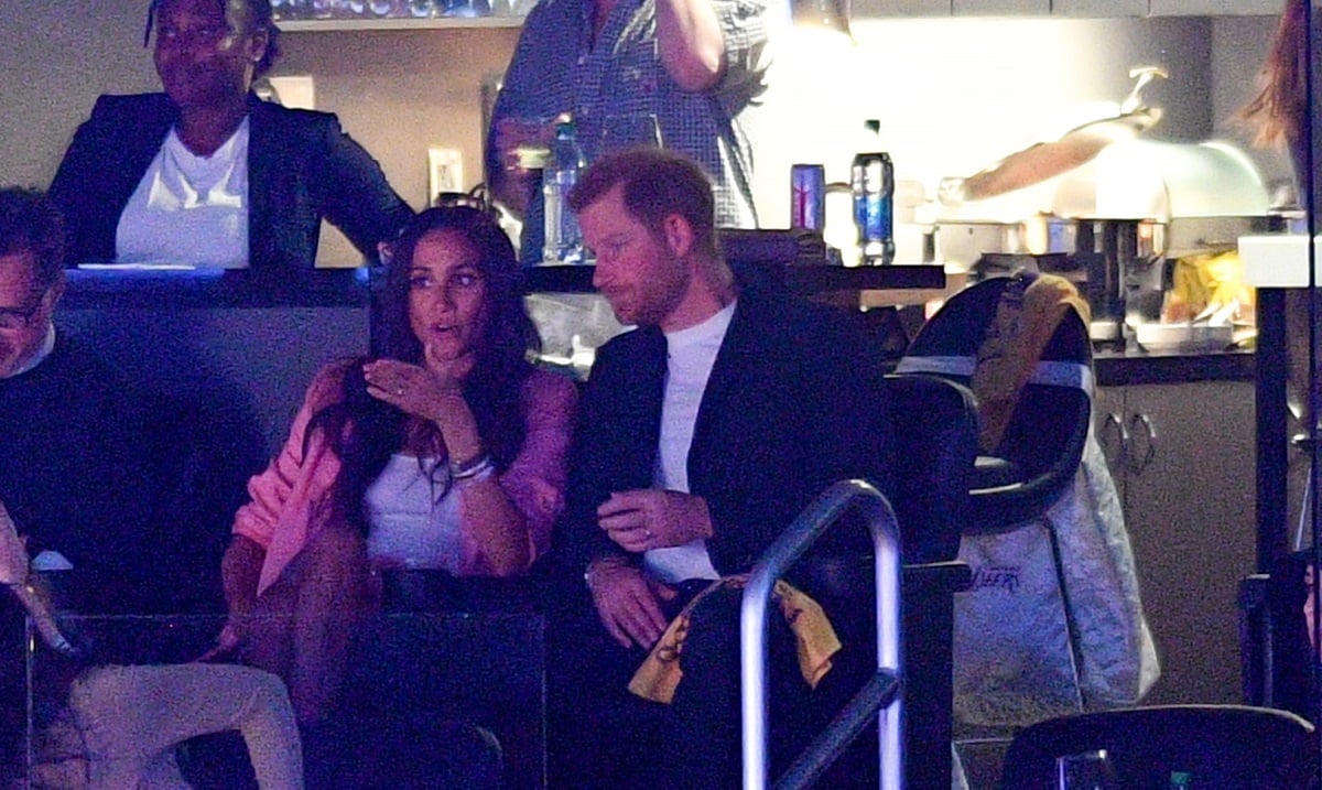 Prince Harry and Meghan Markle are seen at an LA Lakers game