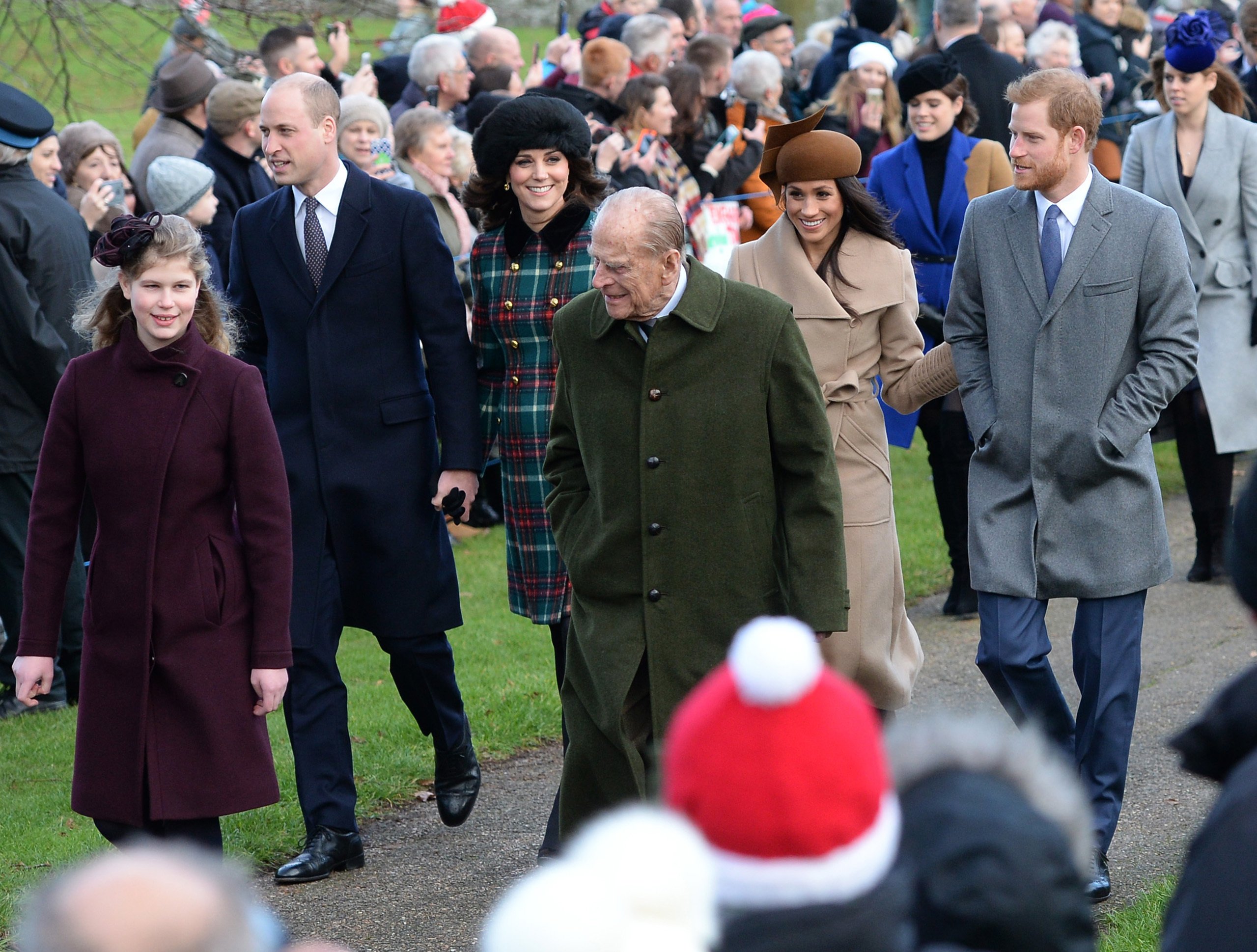 Prince Harry and Meghan Markle walking to church with Prince William, Kate Middleton and other members of the royal family