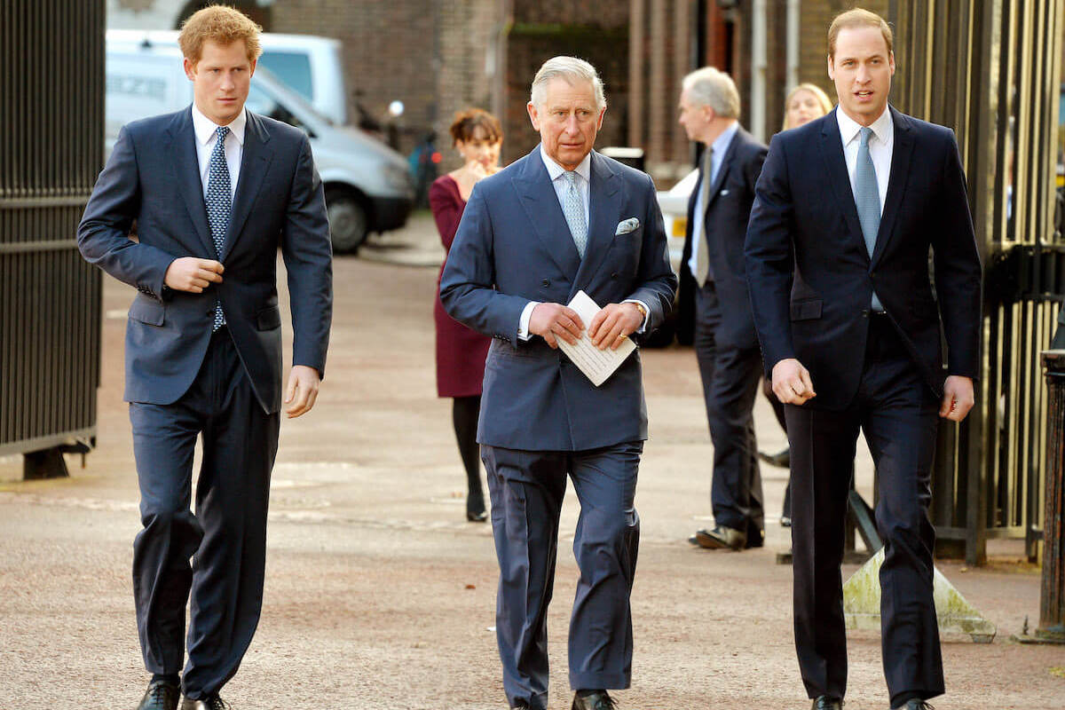 Prince Harry, for whom the coronation will be 'frustrating' with a 'humiliation factor according to an author, walks with King Charles and Prince William