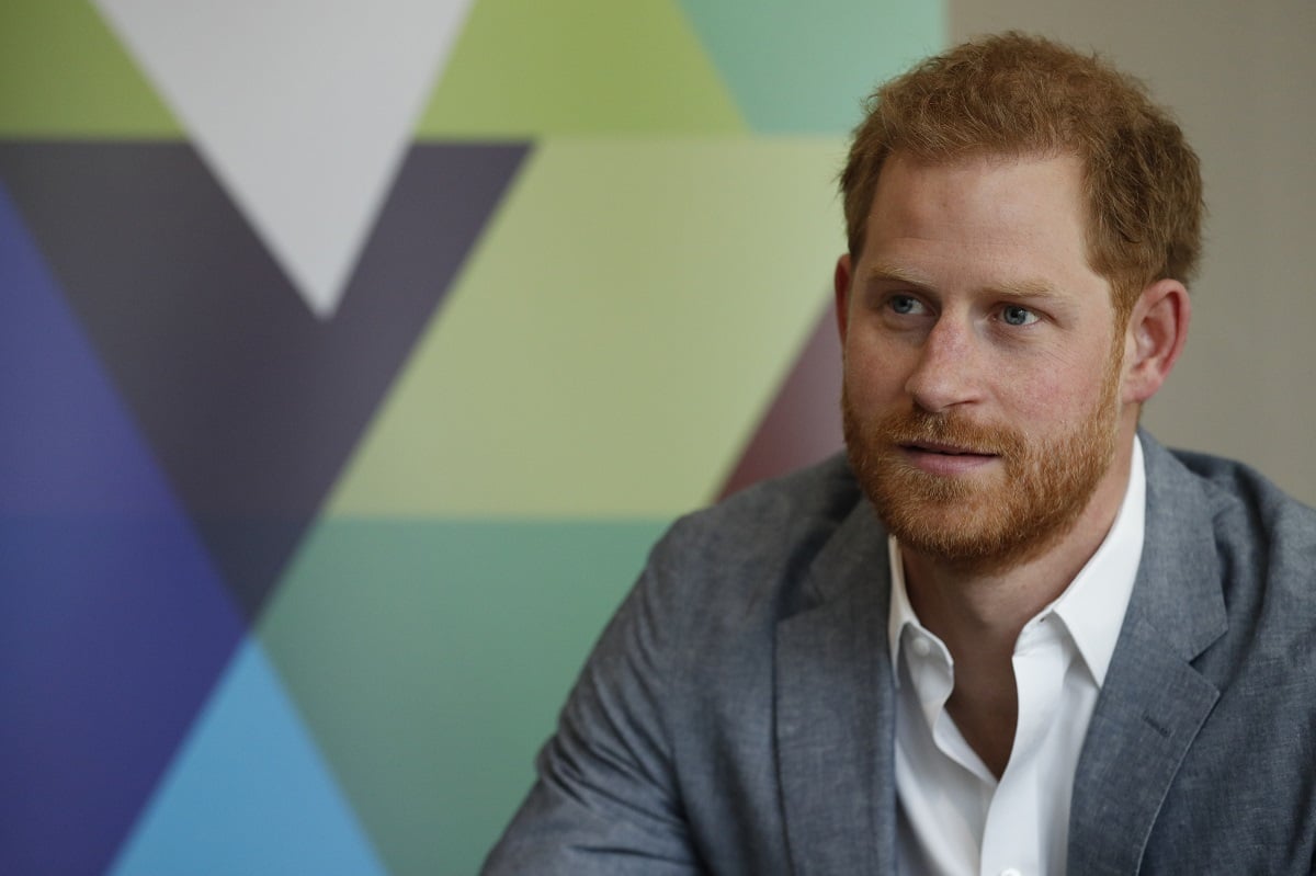 Prince Harry listens to Youth Ambassadors Mental Health Champions during a visit to YMCA