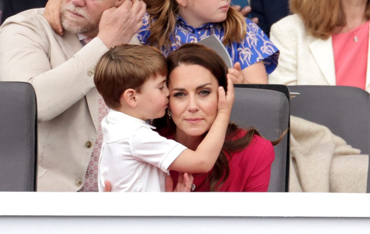 Prince Louis gives Kate Middleton a hug and kiss during the Platinum Pageant