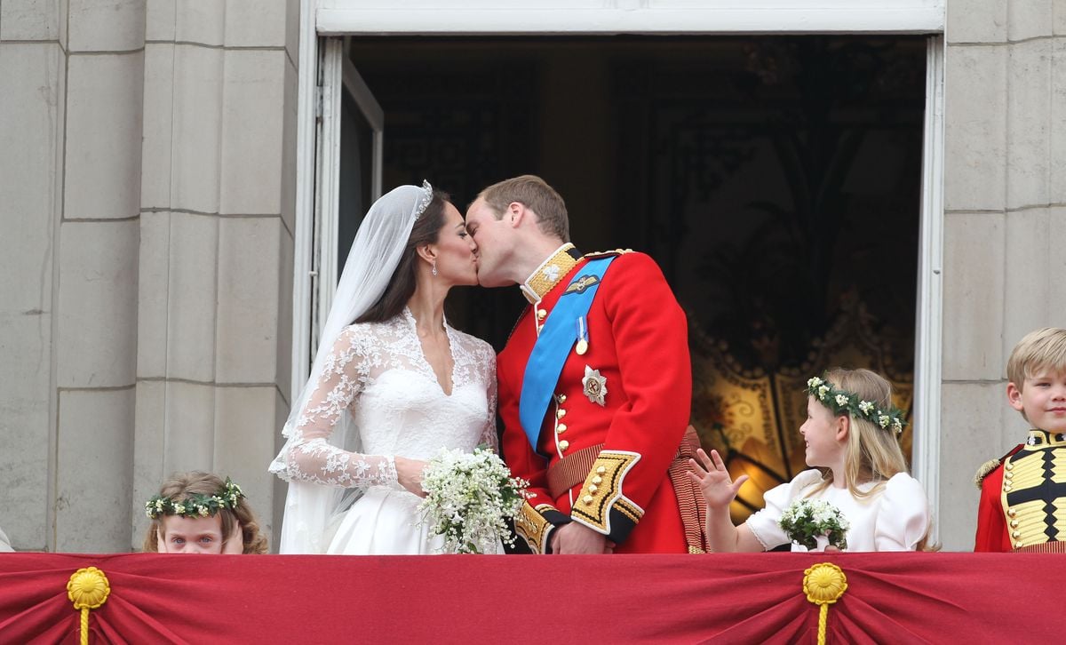 Prince William and his bride Catherine Middleton kiss following their Royal Wedding