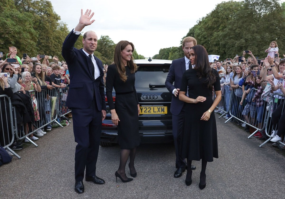Prince William, Kate Middleton, Prince Harry, Meghan Markle getting ready to leave the Long Walk at Windsor Castle after walkabout