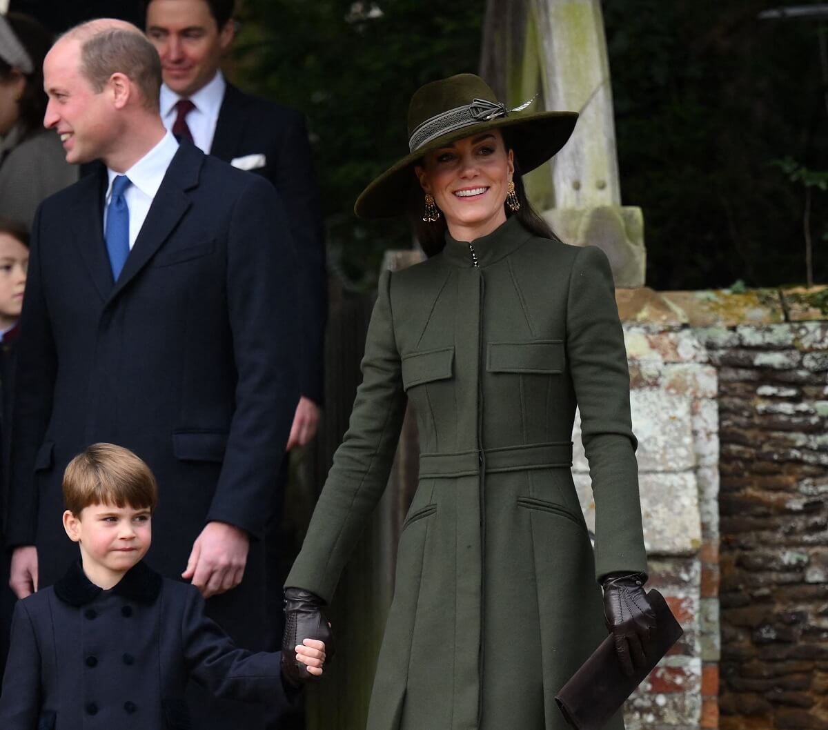 Prince William, Kate Middleton, and Prince Louis leaving church service on Christmas Day