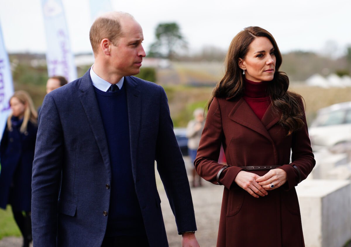 Prince William and Kate Middleton looking to the side