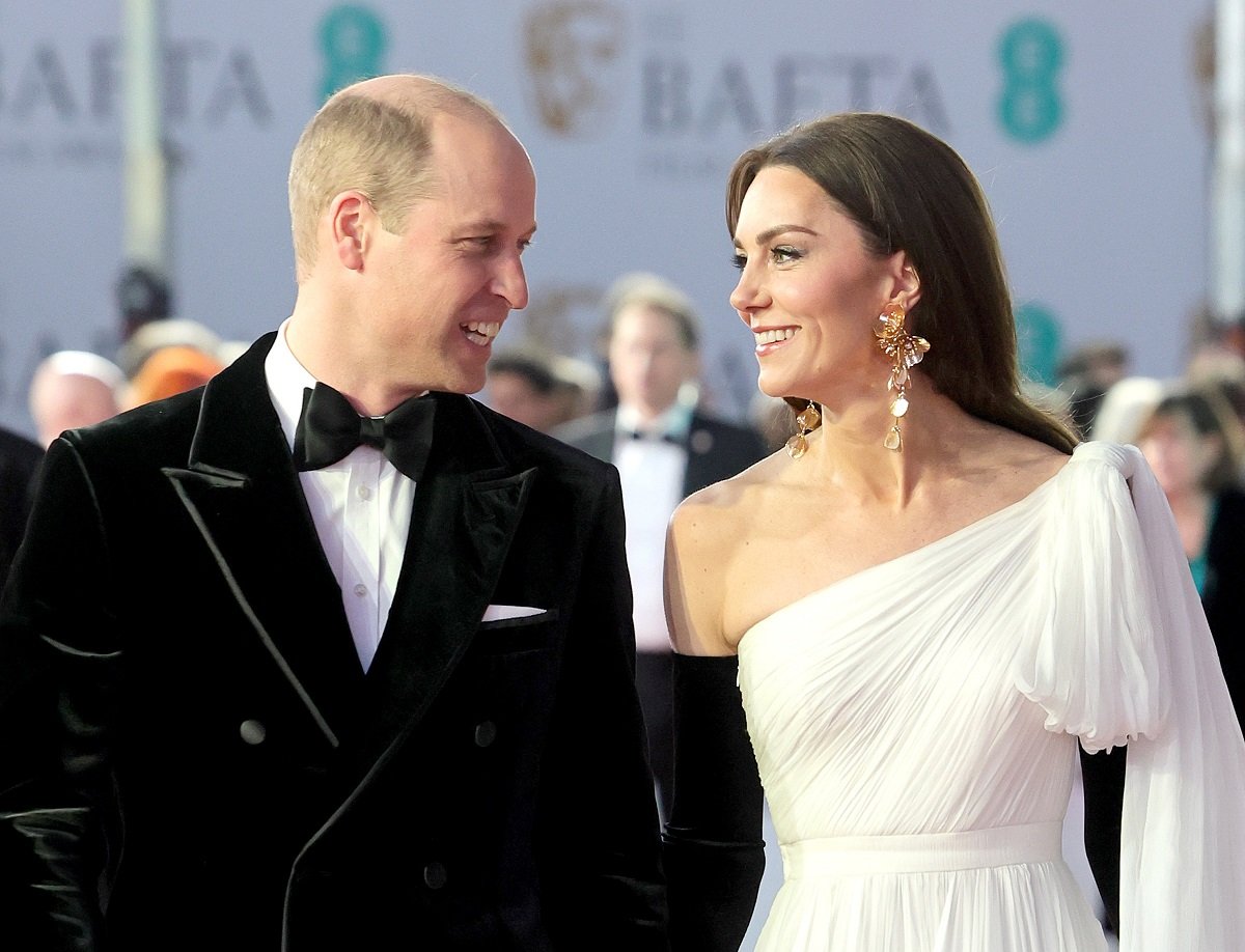 Prince William and Kate Middleton, whose relationship a body language expert compared to Zara and Mike Tindall's, attend the EE BAFTA Film Awards 2023