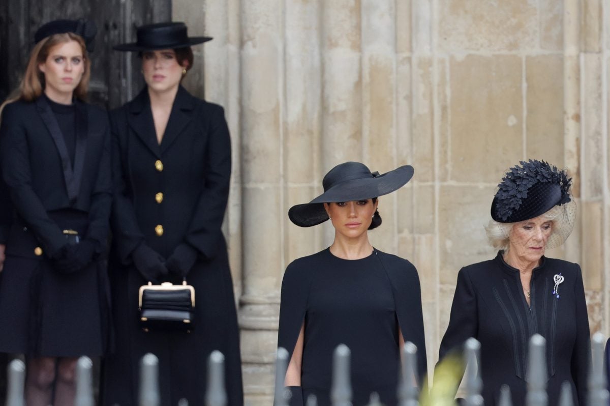 Princess Beatrice, Princess Eugenie, Meghan Markle, and Queen Camilla are seen during The State Funeral Of Queen Elizabeth II