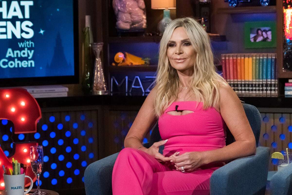 RHOC star Tamra Judge smirks during an appearance on WWHL