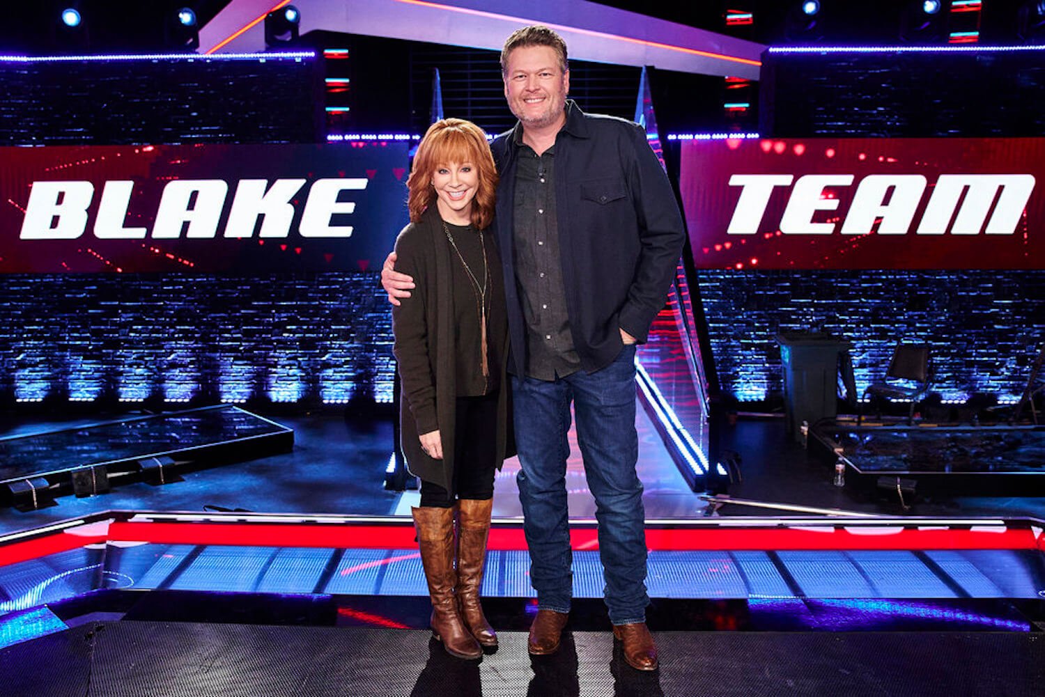 Reba McEntire and Blake Shelton standing together on stage on 'The Voice' Season 23 Knockout Rounds