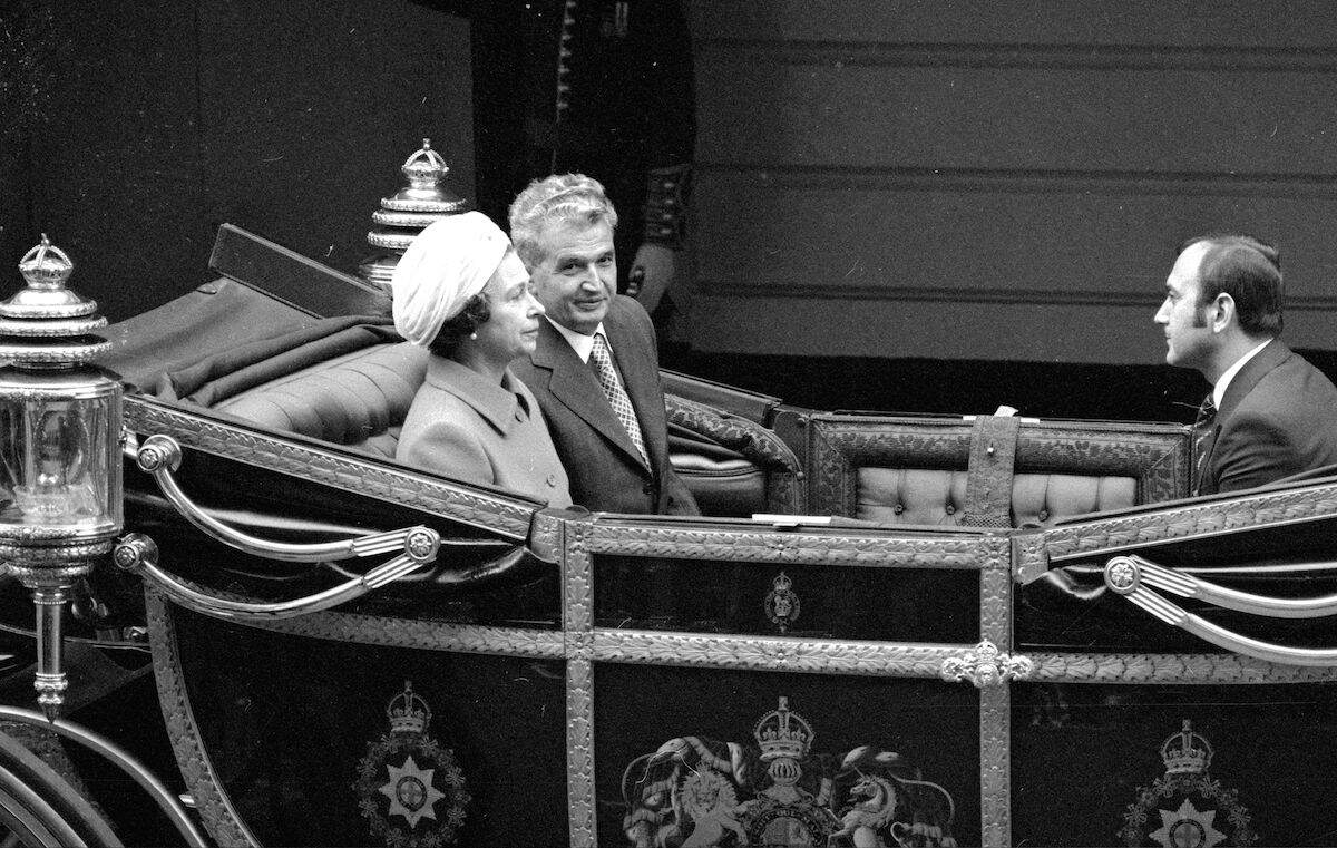 Romanian president Nicolae Ceausescu and Queen Elizabeth II leaving Victoria Station, London for Buckingham Palace, at the start of his four-day state visit to Britain