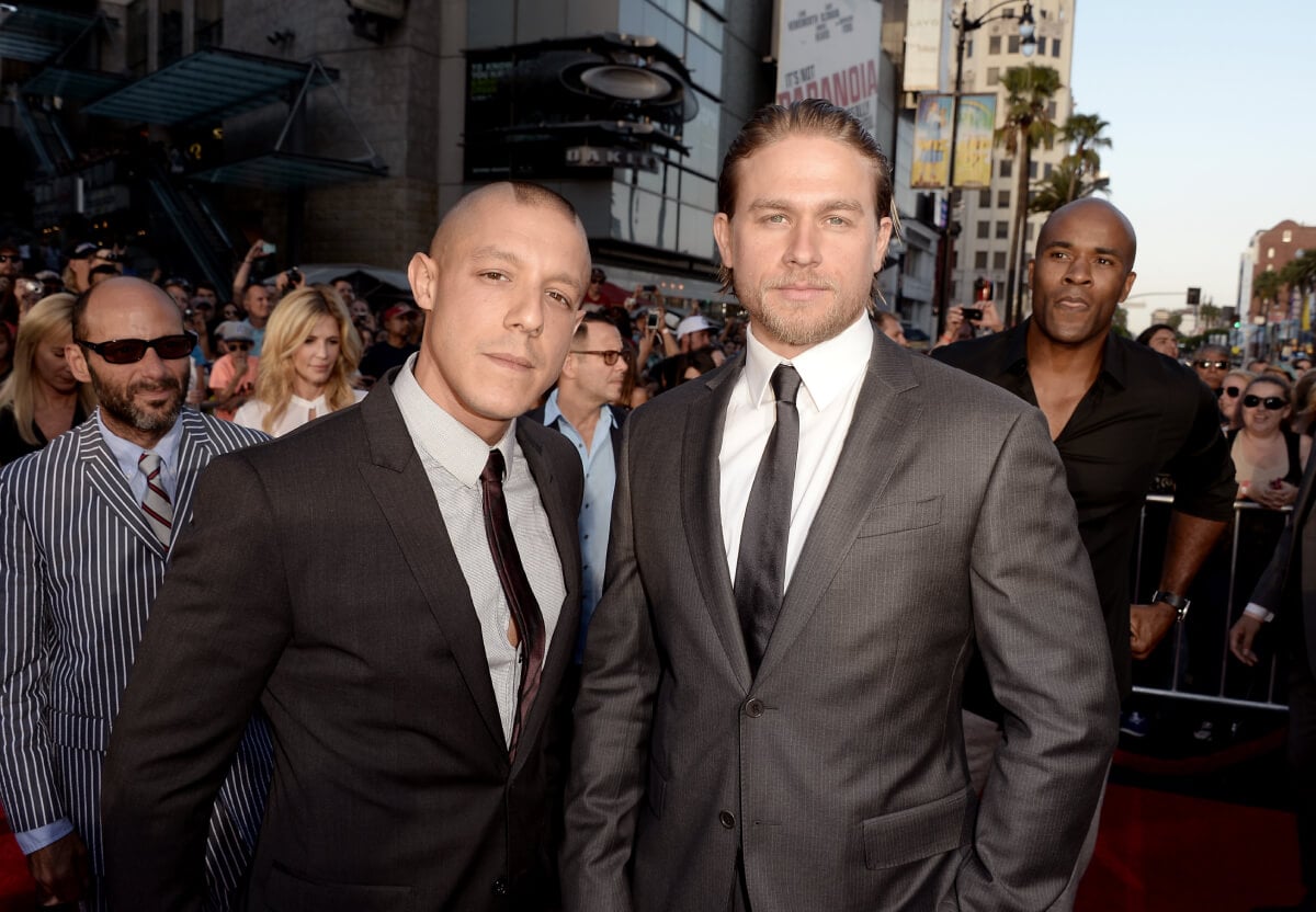 Theo Rossi and Charlie Hunnam attend the season 6 premiere of FX's "Sons Of Anarchy" at Dolby Theatre on September 7, 2013 in Hollywood, California