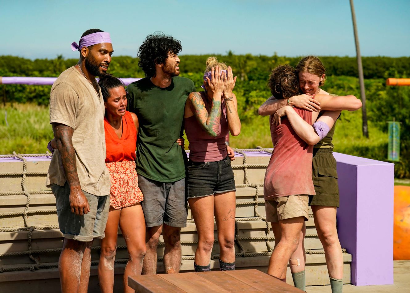 Brandon Cottom, Jaime Lynn Ruiz, Matt Blankinship, Carolyn Wiger, Carson Garrett, and Frannie Marin celebrate their win after an Immunity Challenge in 'Survivor 44' Episode 6 on CBS.