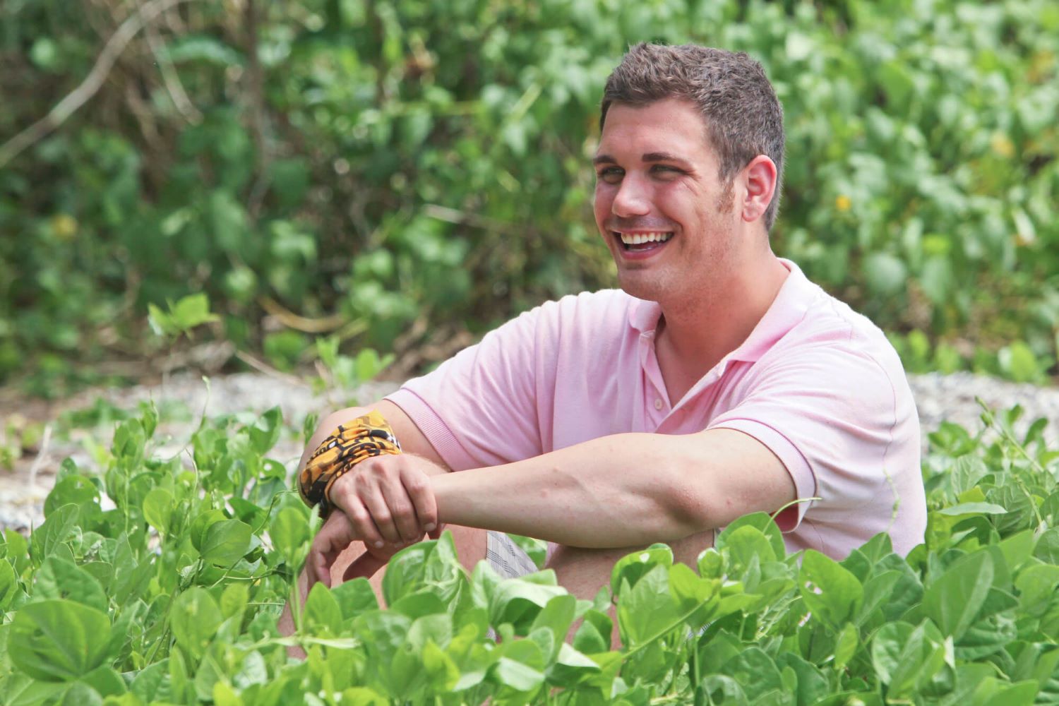 Colton Cumbie , who likely didn't get paid for appearing on two seasons of 'Survivor,' wears a light pink polo shirt.