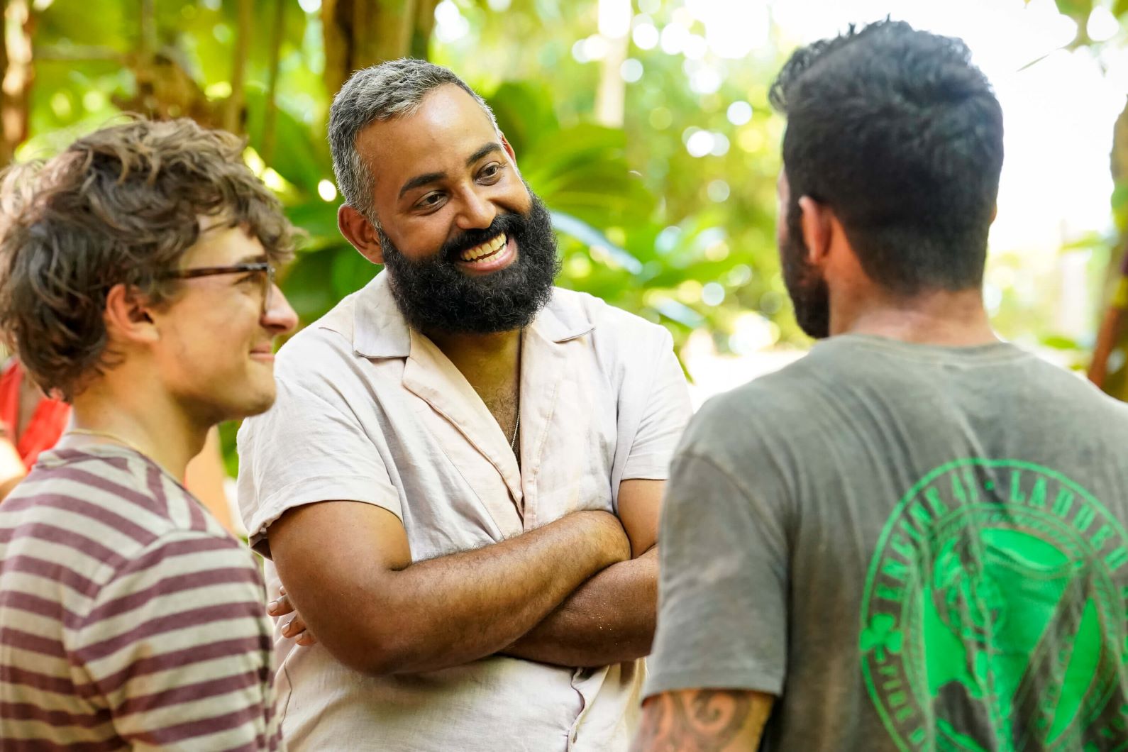 Carson Garrett and Yam Yam Arocho, who, according to 'Survivor 44' spoilers, make it to the final four, appear in 'Survivor 44' Episode 6. Carson wears a purple and light gray striped shirt. Yam Yam wears a white short-sleeved button-up shirt.