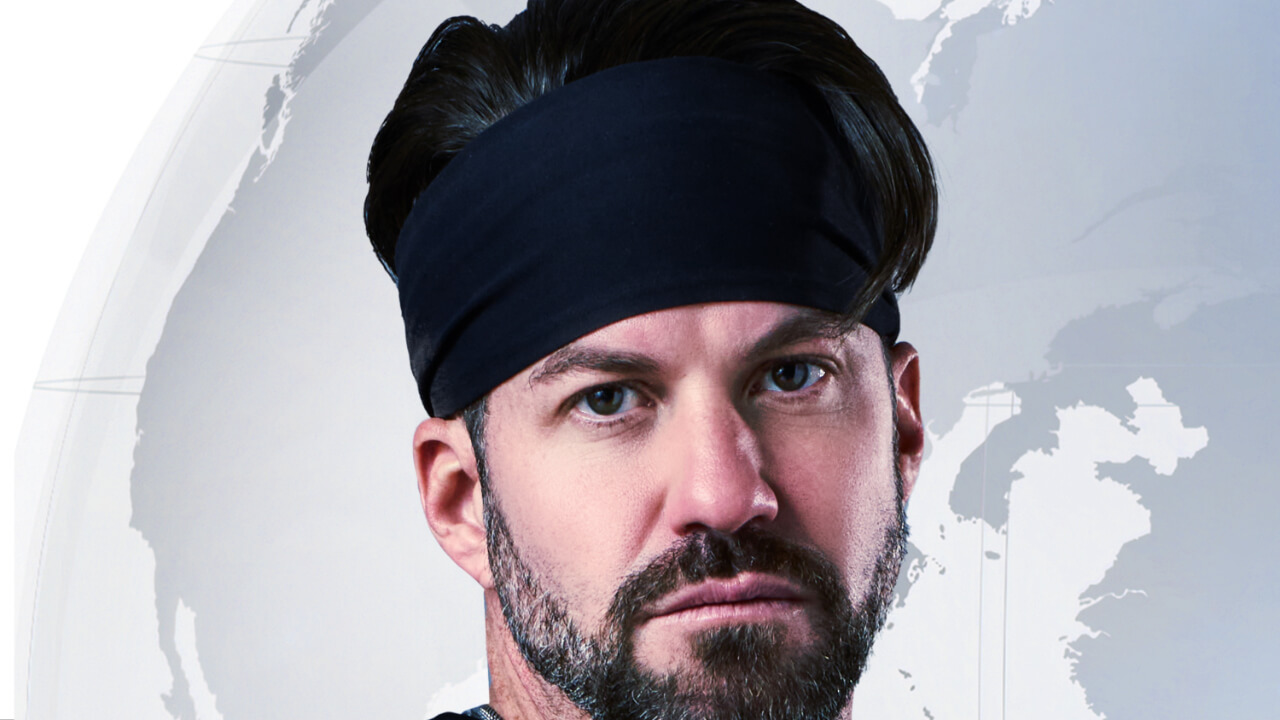 Johnny Bananas Devenanzio posing for 'The Challenge: World Championship' cast photo